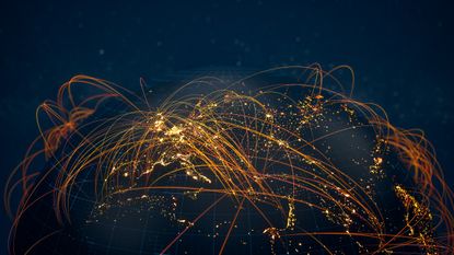 A digital map of Europe, from the west to Russia, covered with glowing orange lines curving in the air from one country to the next to represent Russia's cyber threat and Russian cyber attacks.