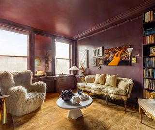 living room purple paint gilded furniture cream chair