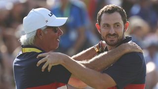 Fred Couples congratulates Patrick Cantlay after his Ryder Cup singles victory over Justin Rose