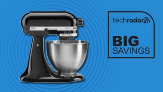 black stand mixer against blue background