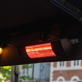 Closeup of electric wall-mounted patio heater