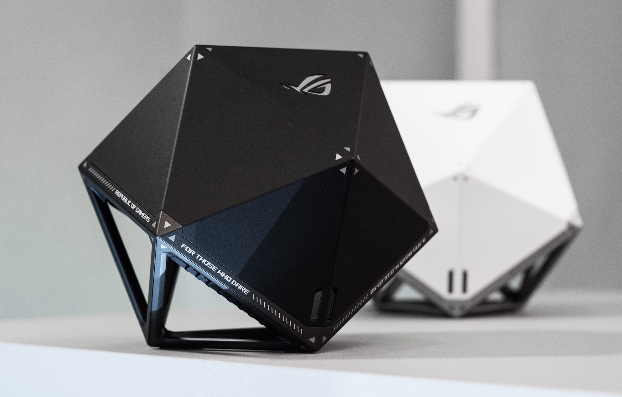 The Asus ROG NeoCore Wi-Fi 8 concept router in black and white