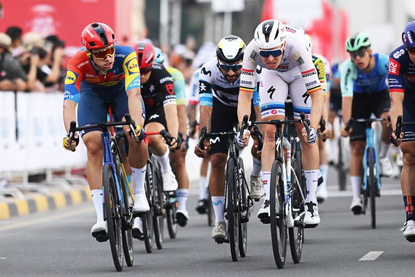 QIDFA, UNITED ARAB EMIRATES - FEBRUARY 20: (L-R) Jonathan Milan of Italy and Team Lidl-Trek, Fernando Gaviria Rendon of Colombia and Team Movistar Team, Tim Merlier of Belgium and Team Soudal Quick-Step cross the finish line during the 7th UAE Tour 2025, Stage 4 a 181km stage from Fujairah Qidfa Beach to Umm al Quwain / #UCIWWT / on February 20, 2025 in Fujairah Qidfa Beach, United Arab Emirates. (Photo by Dario Belingheri/Getty Images)