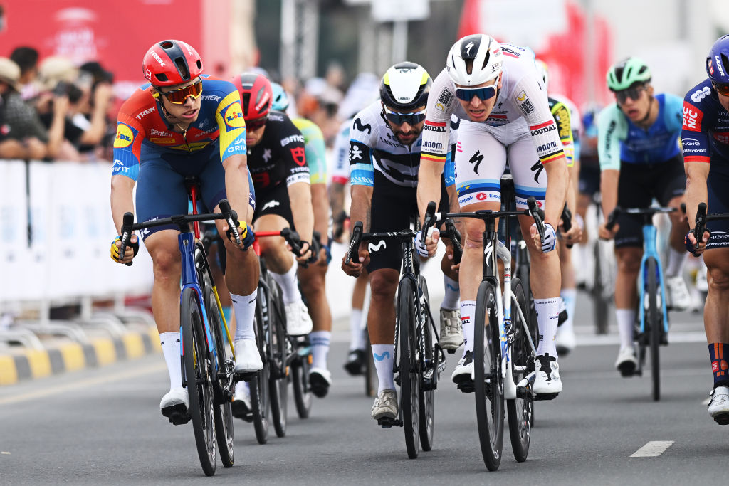 QIDFA, UNITED ARAB EMIRATES - FEBRUARY 20: (L-R) Jonathan Milan of Italy and Team Lidl-Trek, Fernando Gaviria Rendon of Colombia and Team Movistar Team, Tim Merlier of Belgium and Team Soudal Quick-Step cross the finish line during the 7th UAE Tour 2025, Stage 4 a 181km stage from Fujairah Qidfa Beach to Umm al Quwain / #UCIWWT / on February 20, 2025 in Fujairah Qidfa Beach, United Arab Emirates. (Photo by Dario Belingheri/Getty Images)