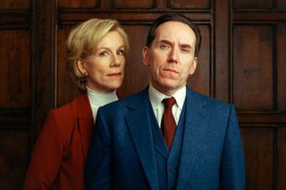 Dr Helena Goldberg (Juliet Stevenson) stands behind the right shoulder of Professor Jasper Tempest (Ben Miller) in a mahogany-panelled room. She has the faintest hint of a smile, he looks entirely serious.