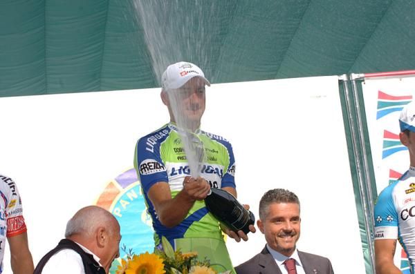 Elia Viviani lets loose with the bubbly.