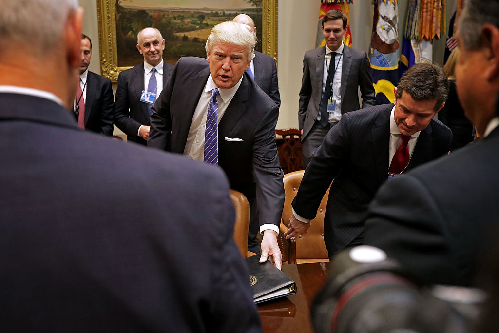 Donald Trump and advisors.