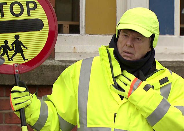 Dennis gets a job - as a lollipop man!