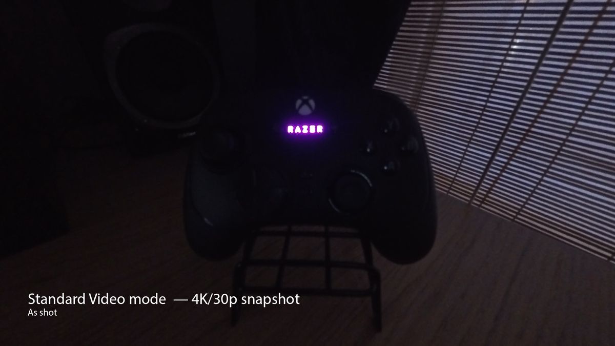 A photo of a Razer controller taken on the Insta360 Ace Pro 2 in low light
