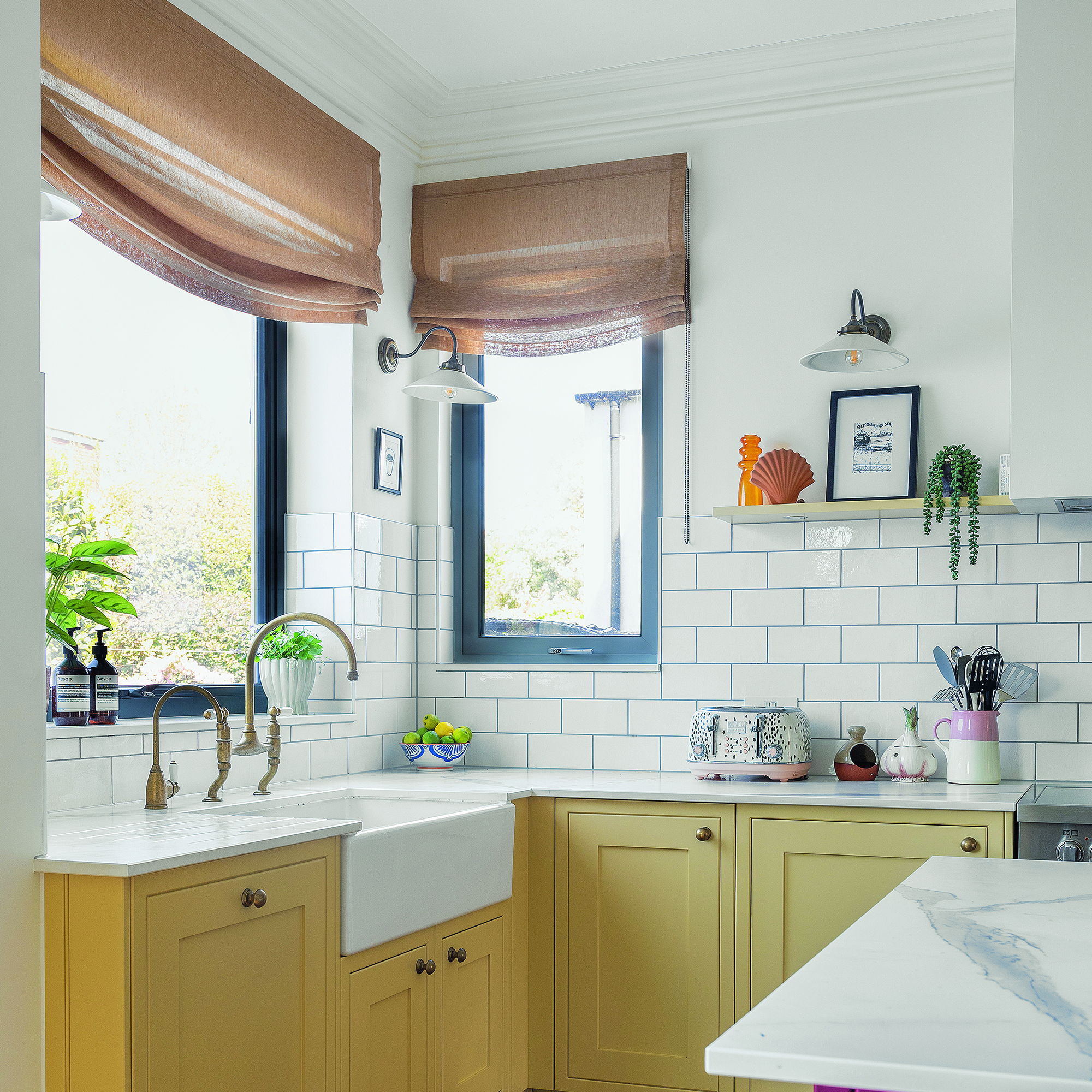 Yellow kitchen with draped blinds