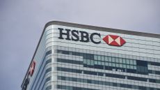 HSBC logo and branding pictured on the company headquarters at Canary Wharf, London, UK. 