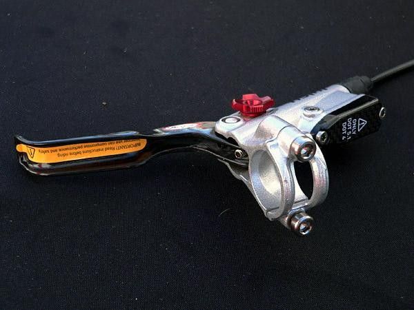 Gone is the solid carbon lever in favor of a lighter thin-walled one.