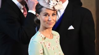 Pippa Middleton arrives at St George's Chapel at Windsor Castle for the wedding of Prince Harry to Meghan Markle on May 19, 2018