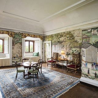 palace with painting wall table and chairs