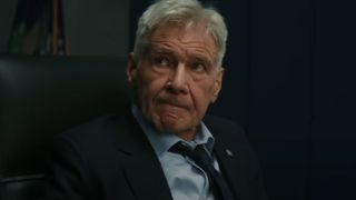 A stressed out Harrison Ford looks up from his chair in Captain America: Brave New World.