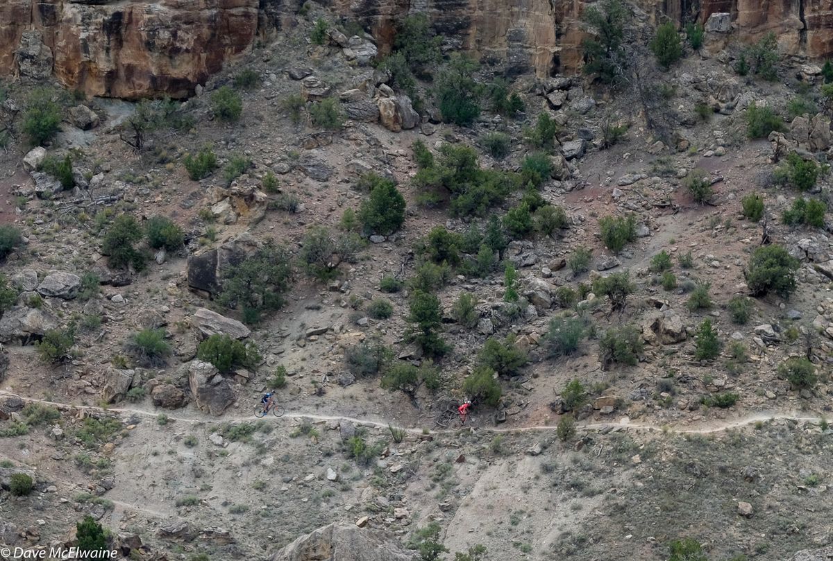 Russell Finsterwald (SRAM) leading Geoff Kabush (Scott) across Gunny&rsquo;s Trail about thirty minutes before the finish