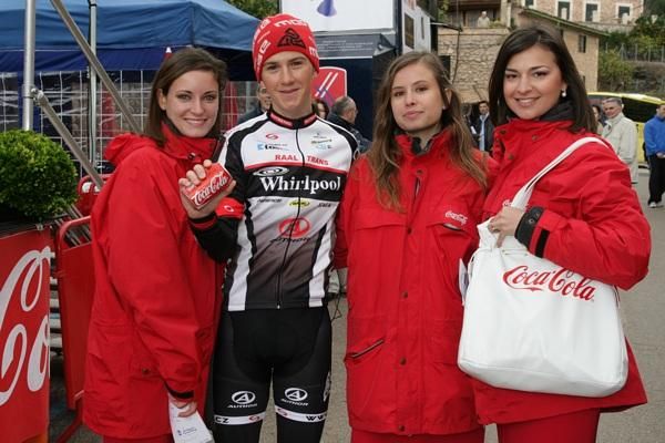 Tomas Danacik gets a bit of attention from the podium girls.