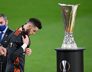 David de Gea walks past the Europa League trophy in Gdansk