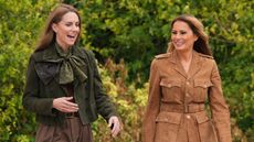 U.S. First Lady Melania Trump and Catherine, Princess of Wales chat as they tour the grounds of Frogmore Cottage