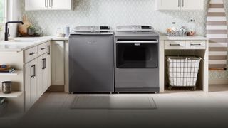 A Maytag washer next to a Maytag dryer in a modern kitchen