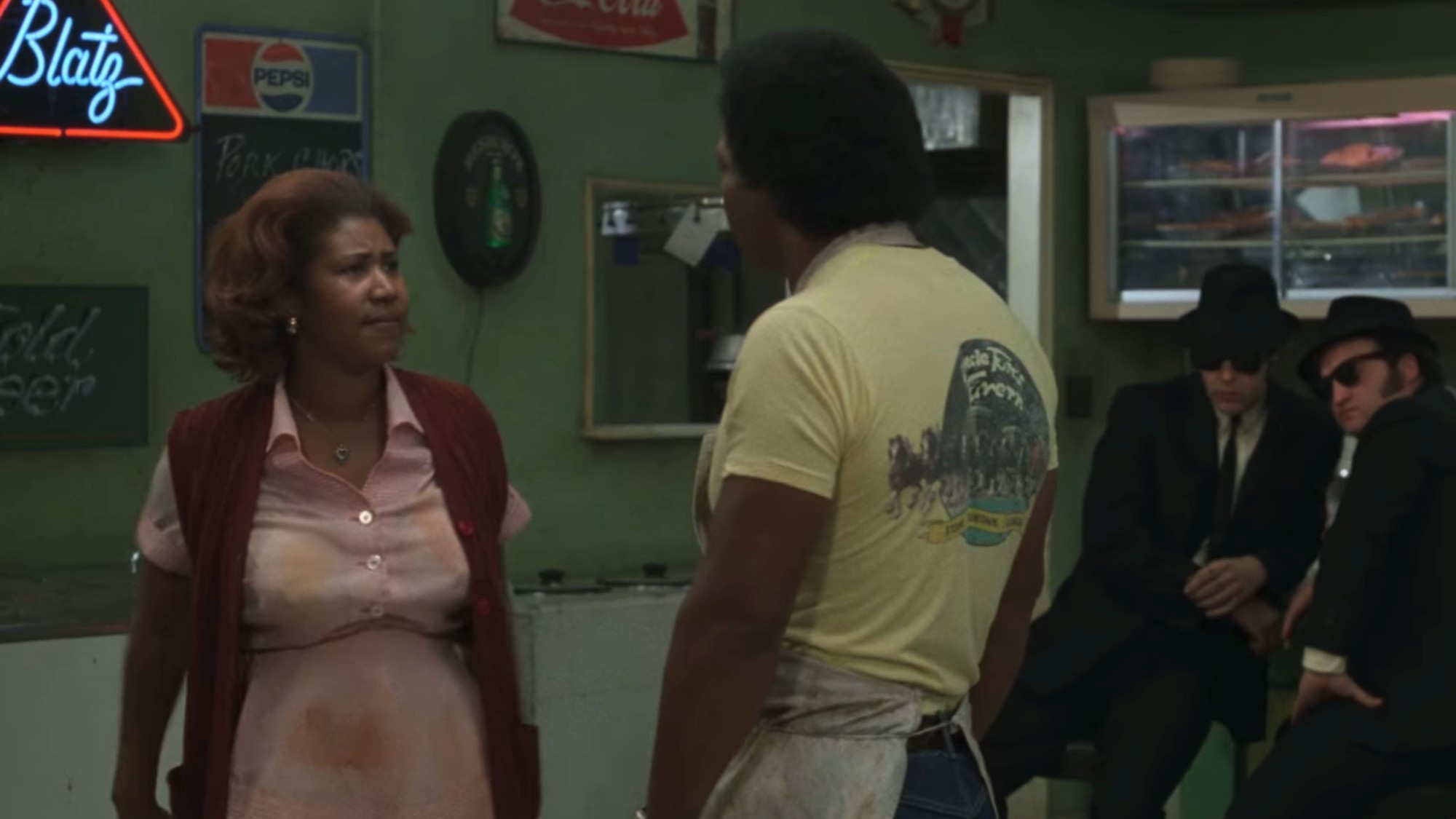 Aretha Franklin looking at Matt "Guitar" Murphy as she sings "Think" in the diner in The Blues Brothers