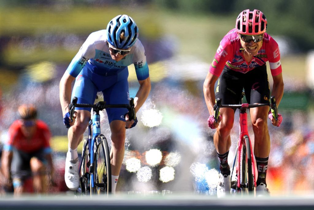 EF EducationEasypost teams Danish rider Magnus Cort Nielsen R cycles past Team BikeexchangeJayco teams Australian rider Nicholas Schultz to the finish line to win the 10th stage of the 109th edition of the Tour de France cycling race 1481 km between Morzine and Megeve in the French Alps on July 12 2022 Photo by Thomas SAMSON AFP Photo by THOMAS SAMSONAFP via Getty Images