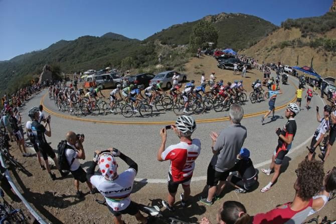 Fans turn out to watch the peloton climb in the Tour of California