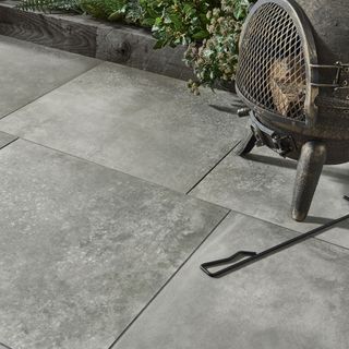 Grey concrete slabs with stove burner