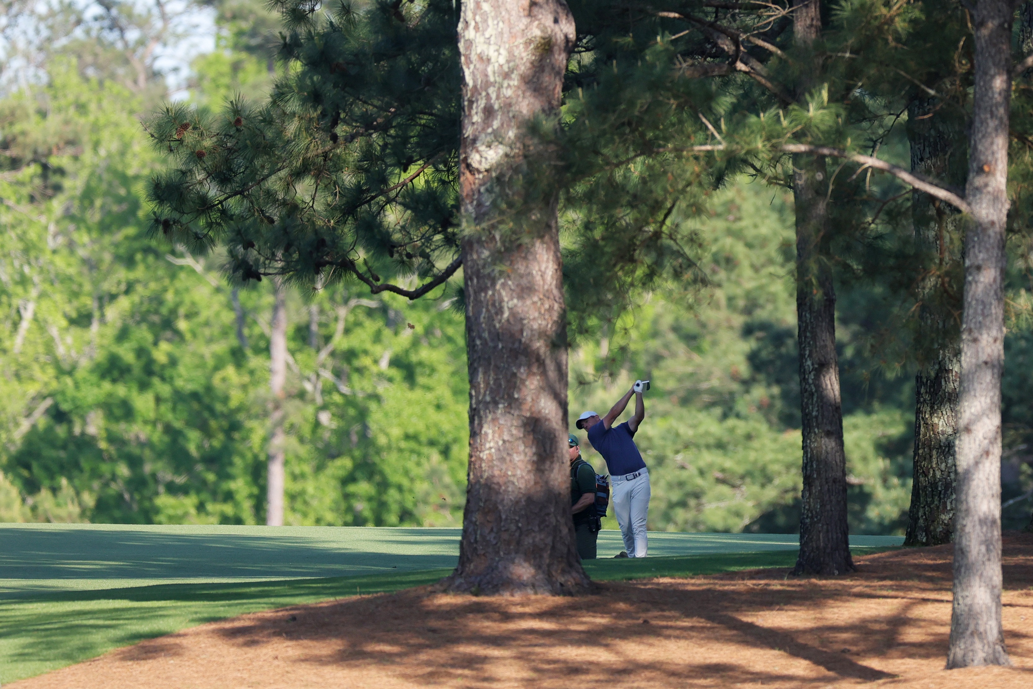 AUGUSTA, GEORGIA - APRIL 13: Rory McIlroy of Northern Ireland plays his second shot on the 15th hole during the final round of the 2025 Masters Tournament at Augusta National Golf Club on April 13, 2025 in Augusta, Georgia. (Photo by Andrew Redington/Getty Images)