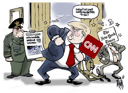 Political cartoon U.S. Trump North Korea missile launch fake news media CNN