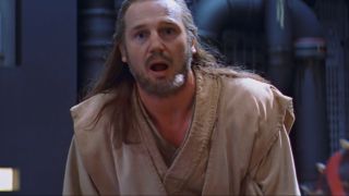 Liam Neeson looking shocked as he takes an unexpected hit in Star Wars: The Phantom Menace.