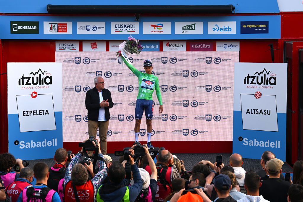 ALTSASU SPAIN APRIL 03 Quinten Hermans of Belgium and Team Alpecin Deceuninck celebrates at podium as Green Points Jersey winner during the 63rd Itzulia Basque Country 2024 Stage 3 a 1909km stage from Ezpeleta to Altsasu 526m UCIWT on April 03 2024 in Altsasu Spain Photo by Tim de WaeleGetty Images