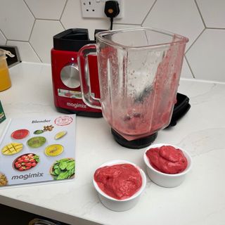Blended banana and raspberry sorbet in bowls in front of Magmix Power Blender