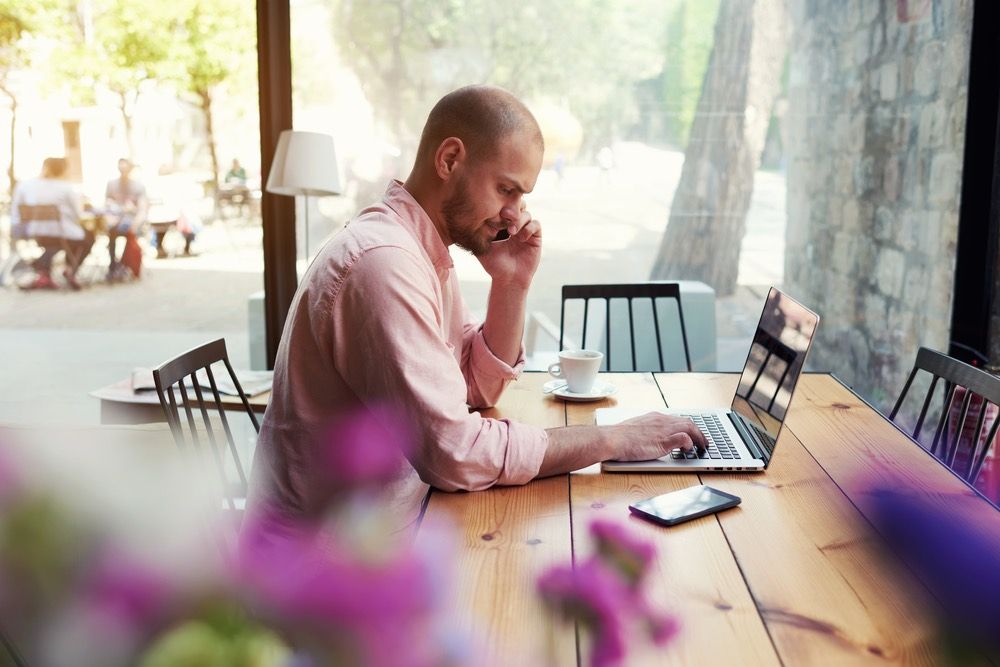 young businessman on laptop.