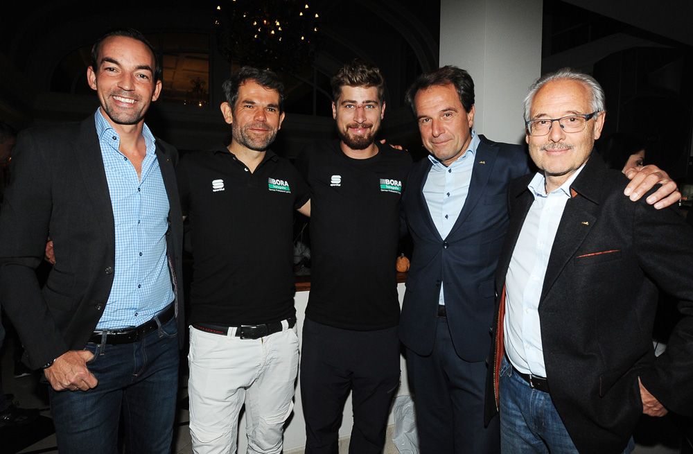 Peter Sagan with Ralph Denk pose for photographs