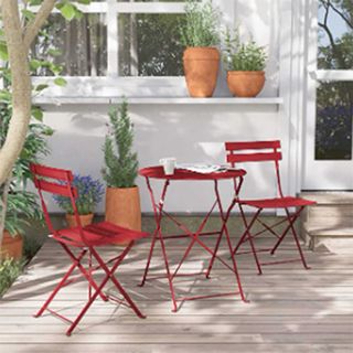 red steel patio chairs and tables 