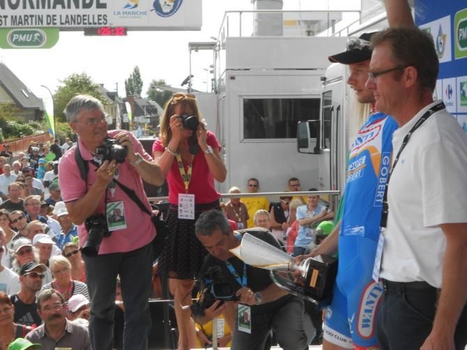 Jan Ghyselinck (Wanty - Groupe Gobert) celebrates his win on the podium at La Poly Normande