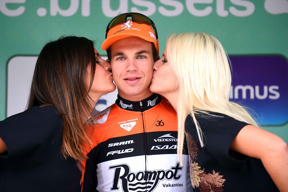 Dylan Groenewegen on the Brussels Cycling Classic podium.