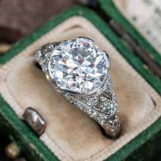 Eragem vintage diamond engagement ring sitting in green box