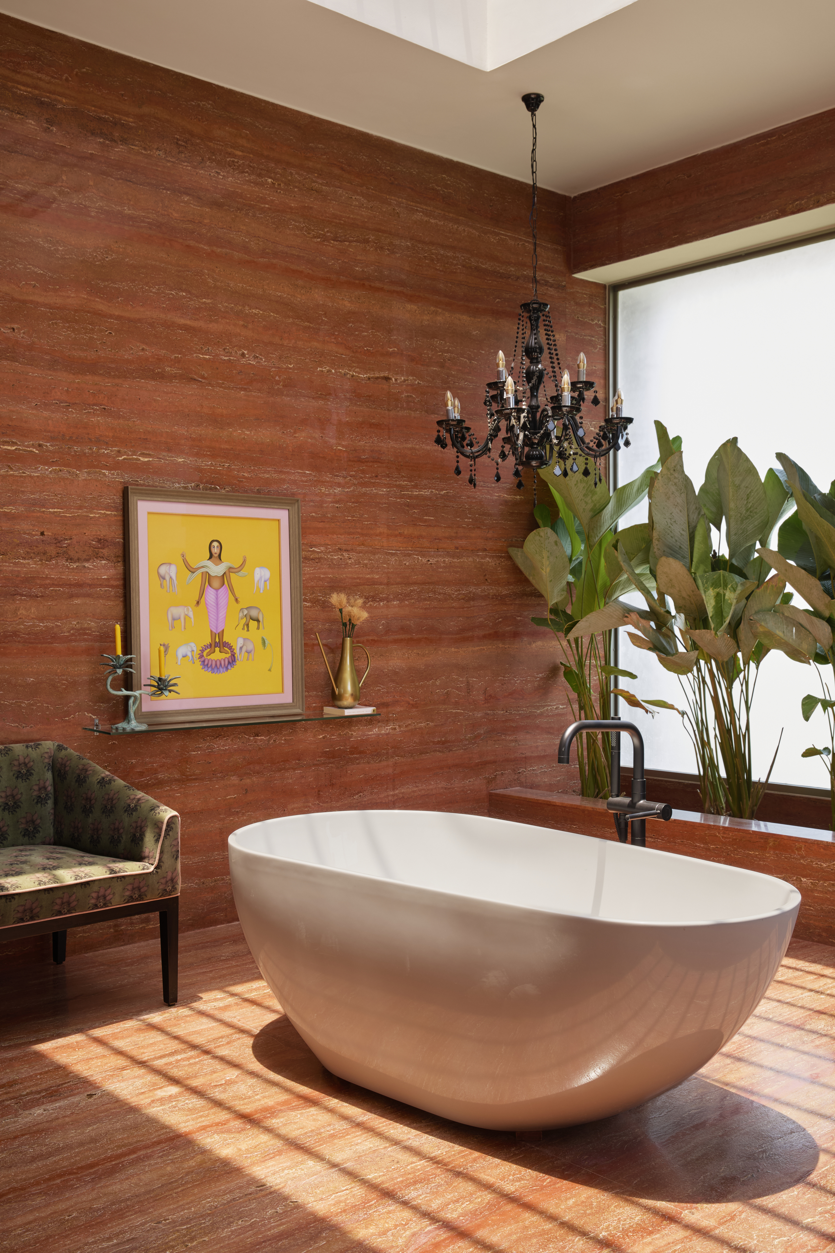 Bathrooms designed in vibrant orange and green tones, using tactile materials