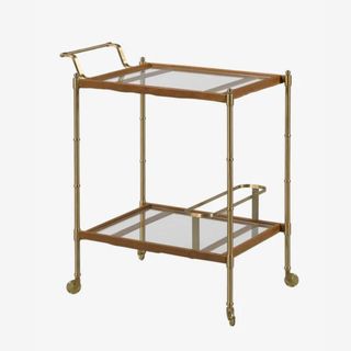 A wood and glass bar cart