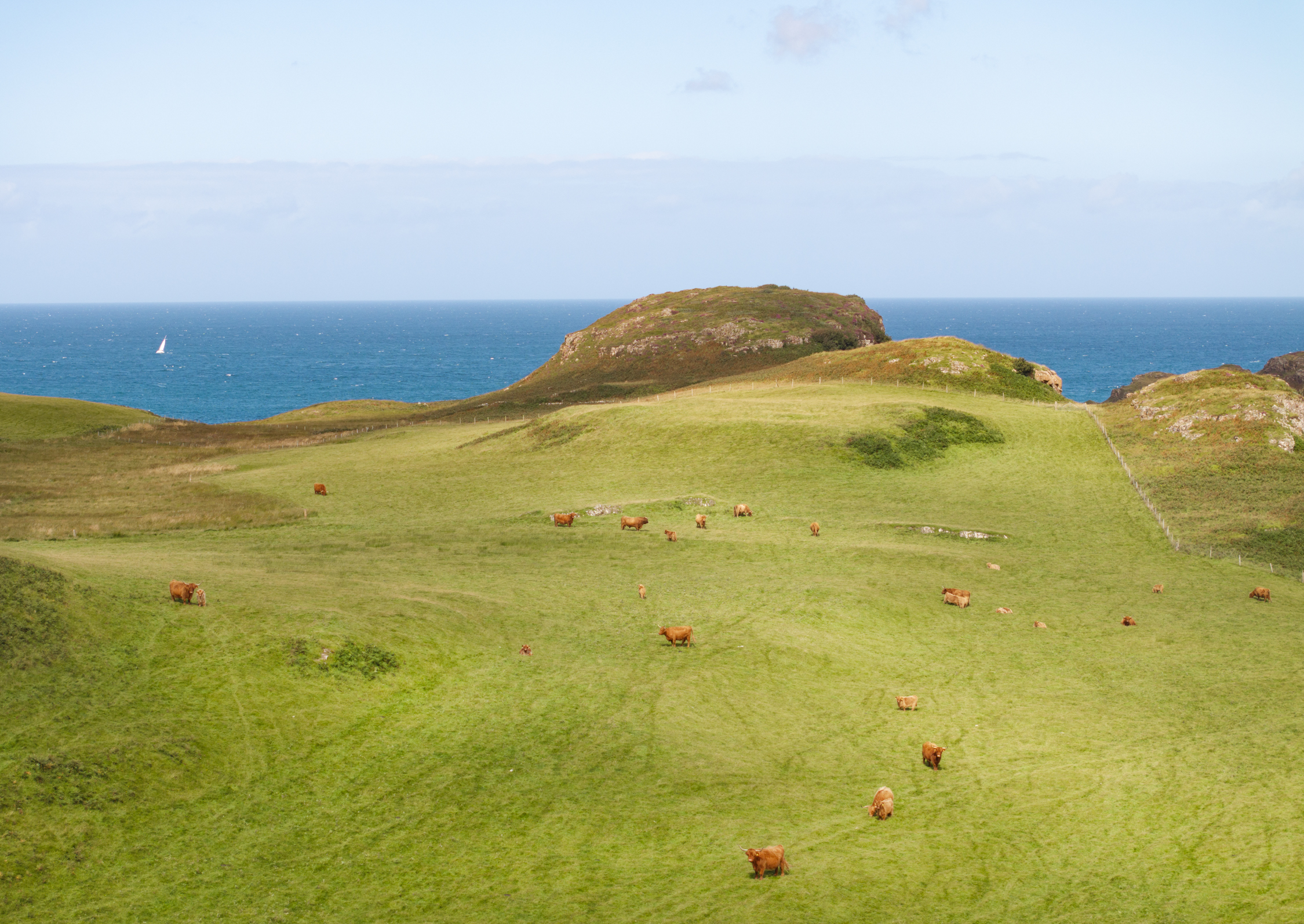 A view of Glengorm castle, with the sea behind