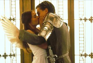 Claire Danes as Juliet and Leonardo DiCaprio as Romeo kiss in Romeo + Juliet