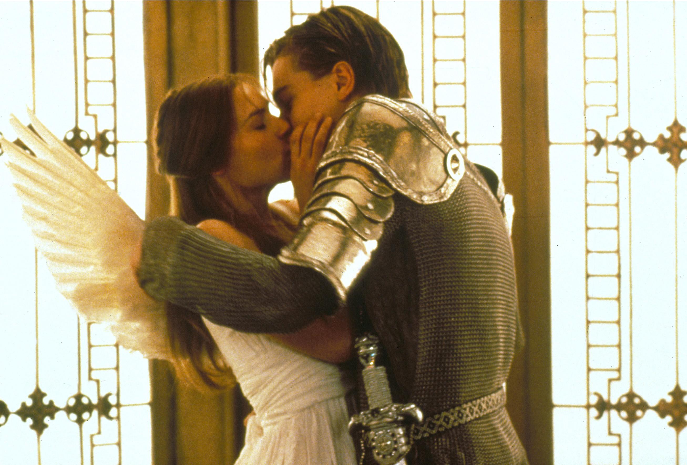 Claire Danes as Juliet and Leonardo DiCaprio as Romeo kiss in Romeo + Juliet