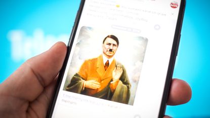 White supremacist meme on Telegram, showing Adolf Hitler