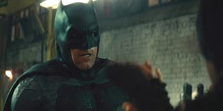 Ben Affleck fights his way through a warehouse in Batman v Superman: Dawn of Justice