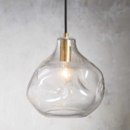 imperfectly-shaped round glass pendant light