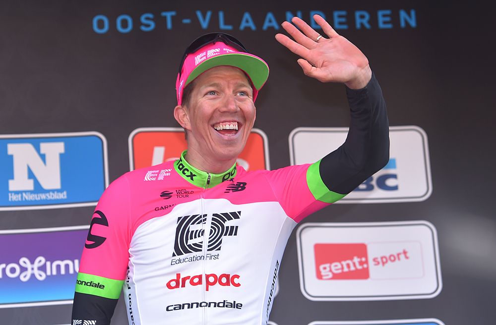 Sep Vanmarcke (EF Education First-Drapac) waves to his infant daughter from the podium at Omloop Het Nieuwsblad Elite