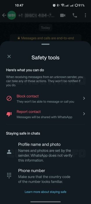 WhatsApp's new safety warning overlay