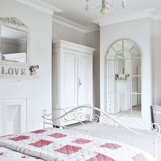 guest room with white wall and couboard